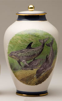 Pottery cremation urns - dolphin design